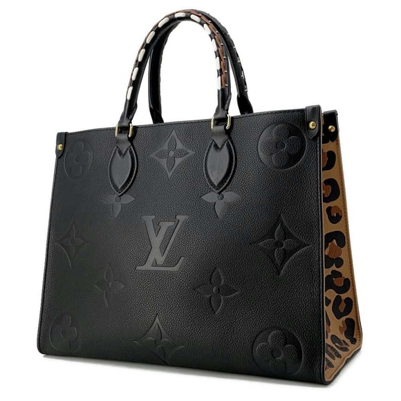 Louis Vuitton Handbags - Louis Vuitton Go Handbag The Empreinte Black Monogram PM On
